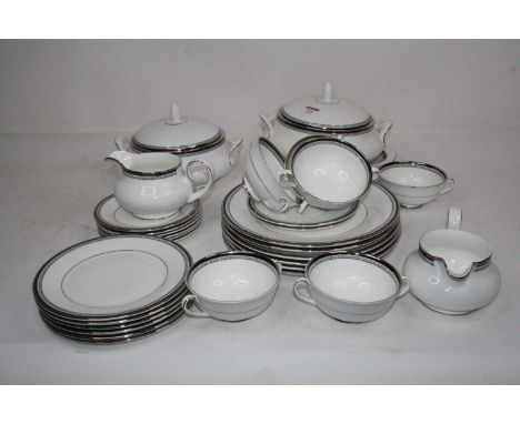 A Royal Doulton 6 place setting dinner and tea service in the Sarabande pattern, H5023