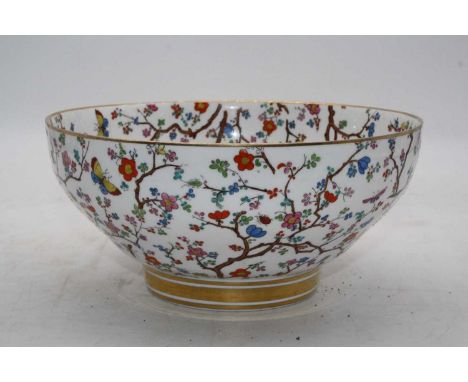 A Copelands Spode porcelain bowl, enamel decorated with birds amongst flowers, 23cm wideThs item is intact but has lots of su