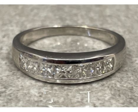 Ladies 18ct white gold diamond half eternity ring. Set in a Chanel setting, approx 1ct size N 3.9g