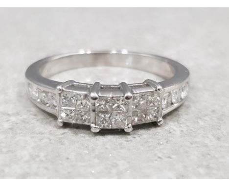 Ladies 18ct white gold 3 stone square cluster ring, featuring 3 squares each set with 4 illusion set princess cut diamonds an