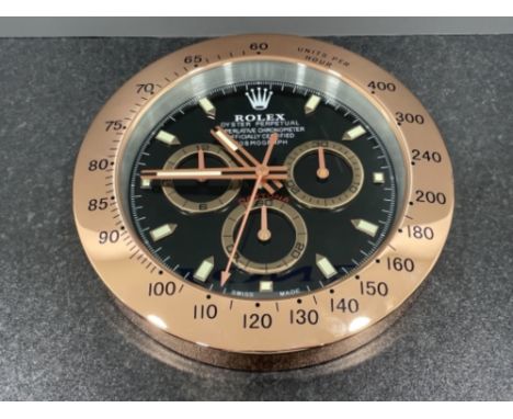 Wall clock in the style of Rolex Daytona gold colour. (34cms)