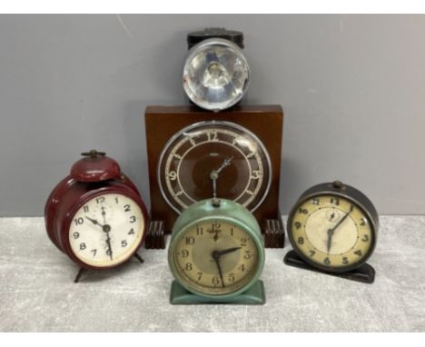 4 various clocks and a lamp