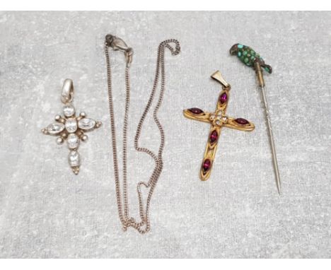 A Victorian turquoise stick pin in the form of a parrot, a silver and white stone crucifix and silver chain, together with a 