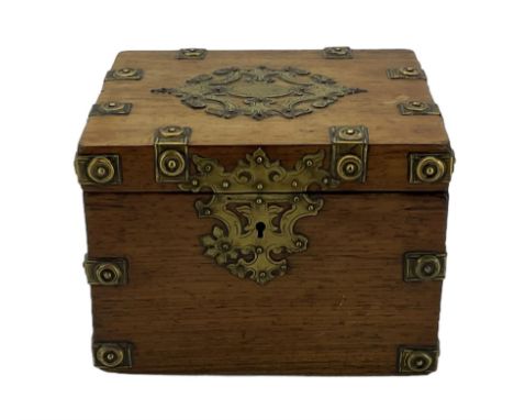 Late 19th century brass bound oak single canister tea caddy, rectangular from with elaborate escutcheons and studded mounts, 