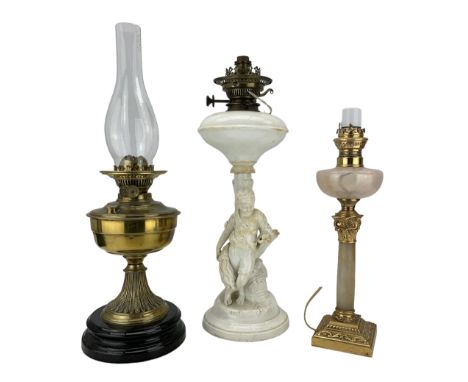 Copelands porcelain oil lamp modelled as Summer, gilt metal corinthian column oil lamp and a Victorian brass oil lamp with gl