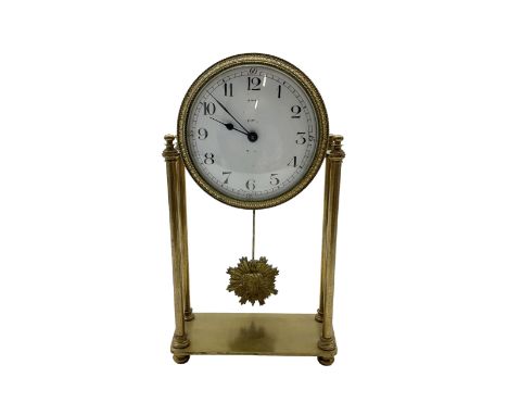French - Early 20th century timepiece mantle clock, movement in a drum case supported by four brass pillars on a raised flat 