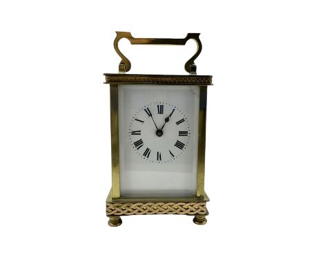 French - late 19th century 8-day carriage clock, plain anglaise case raised on bun feet, enamel dial with Roman numerals and 
