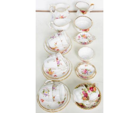 A ROYAL CROWN DERBY POSIES PATTERN TEA SERVICE AND A SMALLER QUANTITY OF TRINKET WARE AND A ROYAL ALBERT OLD COUNTRY ROSES PA