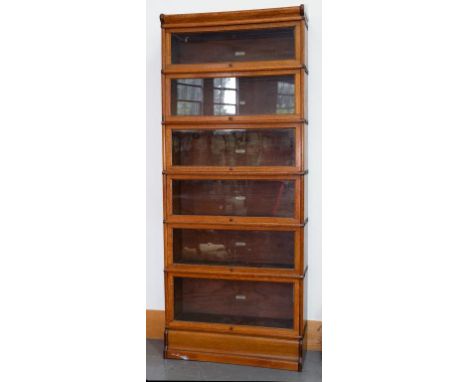 A GLOBE-WERNICKE CO LTD OAK SIX TIER SECTIONAL BOOKCASE, 214CM H, EARLY 20TH CENTURY 