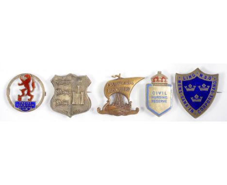 ONE SILVER AND THREE SILVER AND ENAMEL BADGES AND A BRASS 'CRAWFORDS BISCUITS' ADVERTISING LONGSHIP BADGE, ALL EARLY 20TH CEN