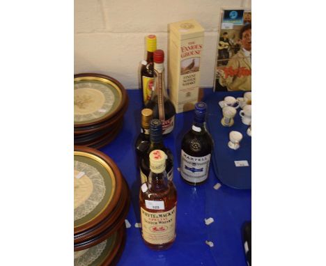 A group lot of Whyte &amp; Mackay Special Scotch Whisky, Martel Cognac, Famous Grouse Whisky, Apricot Brandy and others (7)