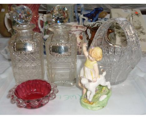 Two hobnail square decanters with silver bottle labels; a cut glass basket; a cranberry dish and a Royal Worcester figure "Ap