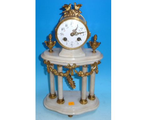 A 19th century Louis XVI style ormolu drum shaped mantel clock on 4 white marble columns with ormolu swags and shaped oval ba