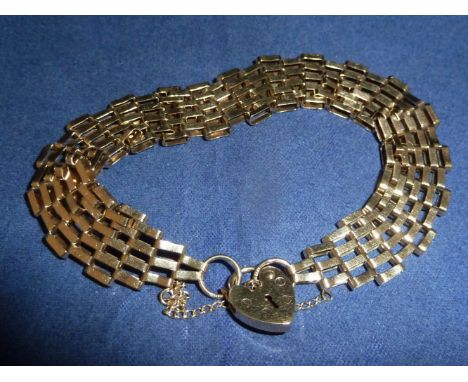A 9 carat gold gate bracelet; a coffee bean pendant and ear studs set