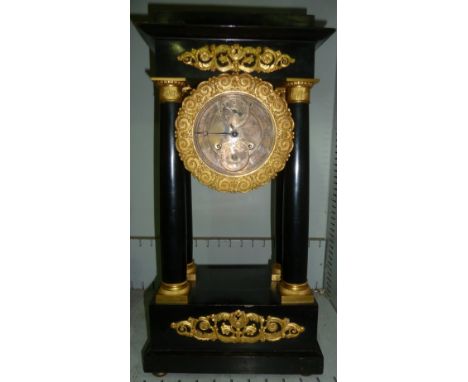 A 19th century ebonized portico clock supported on 4 classical pillars with ormolu mounts, scrolled ormolu bezel, silvered di