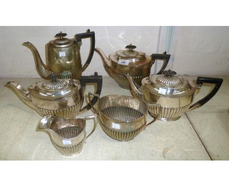 A Georgian style silver plated 4 piece oval ribbed tea service, and 2 similar teapots