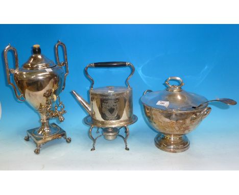 A silver plated chased oval spirit kettle on burner base; a silver plated classical urn shaped tea urn on 4 ball and claw fee