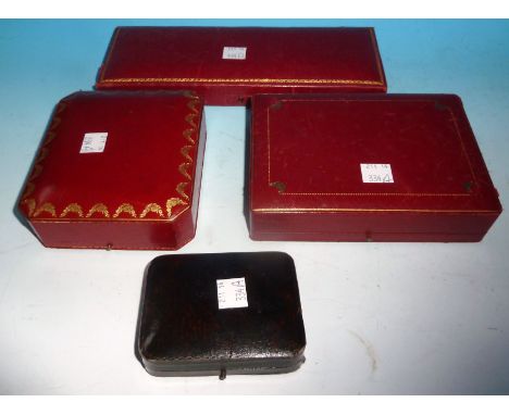 A red leather Cartier cigarette case presentation box; a similar jewellery box; 2 other boxes