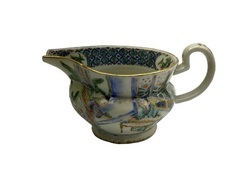 Chinese Famille Verte jug, decorated in green and blue enamel with figural scenes, H8.5cm