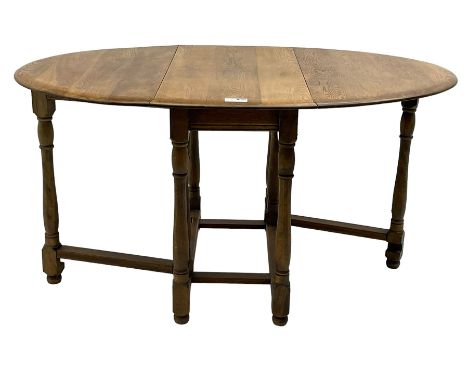 Mid-to-late 20th century oak and beech drop-leaf dining table, gate-leg action base with turned supportsDimensions: Height:&n