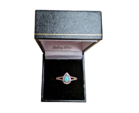 Rose gold on silver pear shaped opal and cubic zirconia ring, stamped 925, boxedCondition Report:Size R