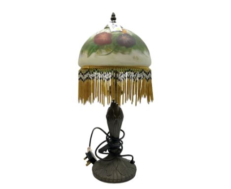 Art Nouveau style bronzed table lamp, with floral printed glass shade hung with beads, overall H55.5cm