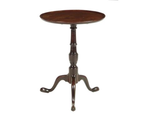  A George III mahogany tripod table, the circular dished tilt-top on a vase turned stem, top and base possibly associated, 61