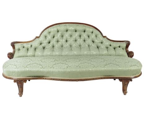  A Victorian walnut sofa, button upholstered with green damask fabric, 83.3cm high, 180.5cm wide, 80cm deep,