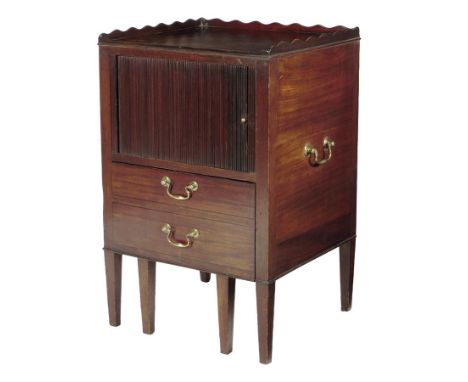  A late George III mahogany tray-top bedside commode, with a wavy edged gallery above a tambour shutter and a converted pull-