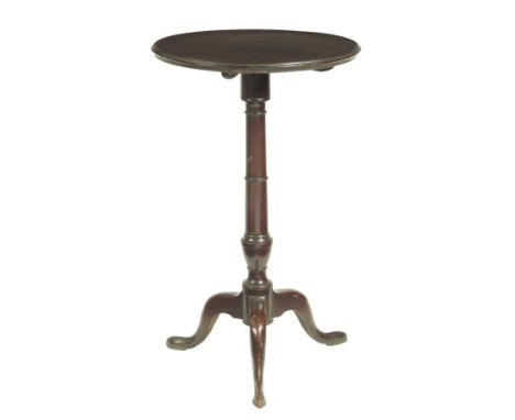  A George III mahogany tripod table, the circular dished top on a turned vase stem, the top and base possibly associated, 70.