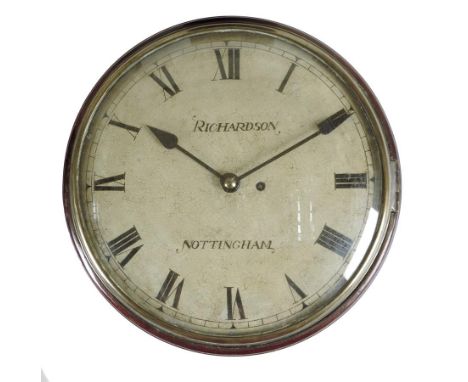  An English dial wall clock, the single fusee movement within a mahogany case and a brass bezel with a twelve inch white enam