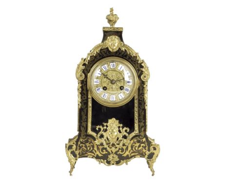  A late 19th century French boulle mantel clock, with an eight day movement stamped '12712', striking on a bell within a cut 