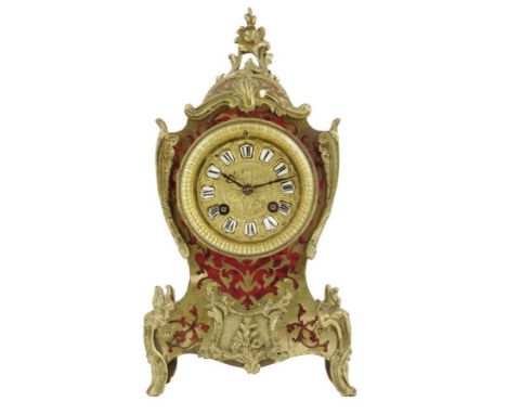  A French boulle mantel clock, the striking movement numbered 675 with unnumbered pendulum, the gilt dial with white enamel n