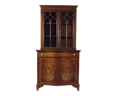  An Edwardian mahogany and marquetry bookcase cabinet, with satinwood banding, with a pair of glazed doors enclosing two shel