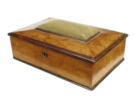 λ A Victorian burr walnut and rosewood sewing box, the hinged lid with a pin cushion, the interior with a mirror and eleven d