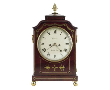  A George IV mahogany mantel clock, the eight day repeating movement striking on a bell, with a white enamel dial with Roman 