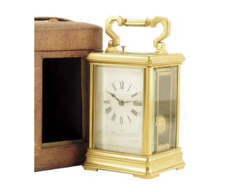  A French gilt brass repeating carriage clock, the platform lever escapement striking on a gong and numbered '12747', with a 