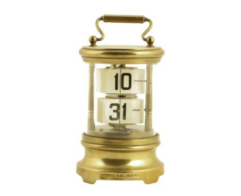  An early 20th century Ever Ready ticket clock, with two tiers of flick tickets, the upper for hours, the lower for minutes, 