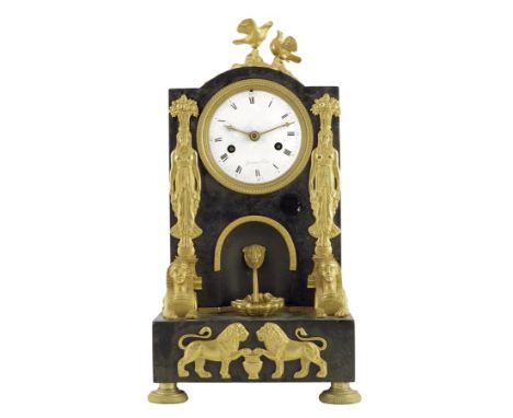  An early 19th century French marble and ormolu mantel clock, the eight day movement with an outside countwheel striking on a