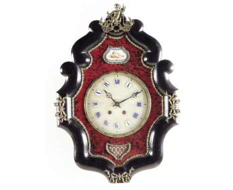 λ A French vineyard clock, the porcelain dial applied with enamel numeral reserves, the striking movement in a tortoiseshell 