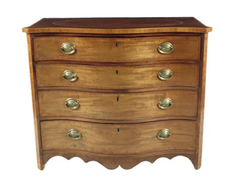  A George III mahogany serpentine commode, with kingwood banding, the crossbanded top with an oval panel above four long draw