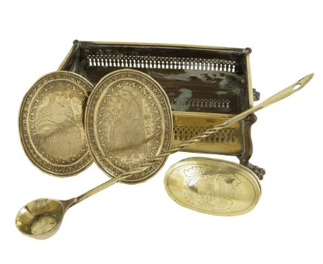  A 19th century brass tray, with pierced sides on cast paw feet, 36cm wide, together with a Dutch brass snuff box, a brass to