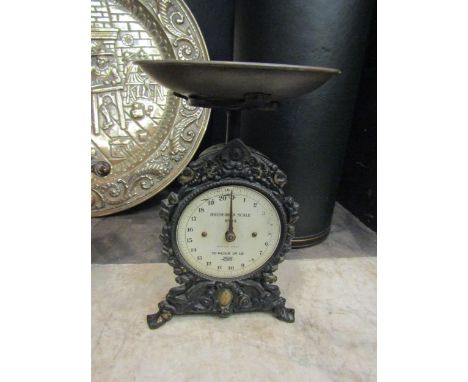 A set of Salters kitchen scales with decorative embossed front 