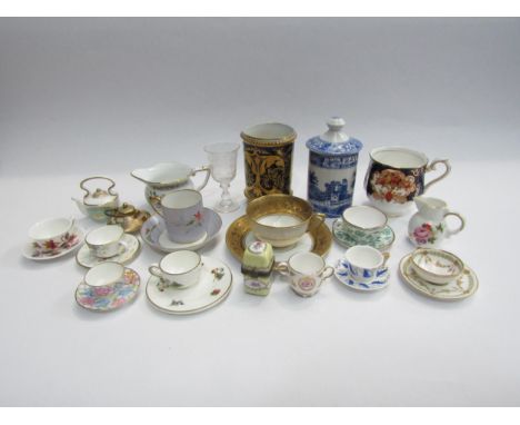 A collection of miniature ceramics: seven miniature cups and saucers, a Derby spill vase cobalt blue with gilt decoration, a 