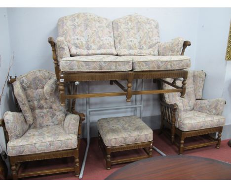 Ercol 'Old Colonial' Two Seater Settee, two armchairs and footstool.