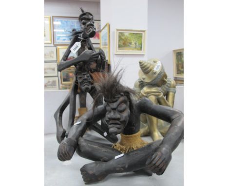 Vintage Carved Ebonized Figure of&nbsp; Indonesian Tiki Man, seated 16cm high, a similar group with man on another's shoulder