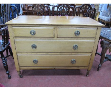 An Early XX Century Light Oak Chest of Two Short and Two Long Drawers.