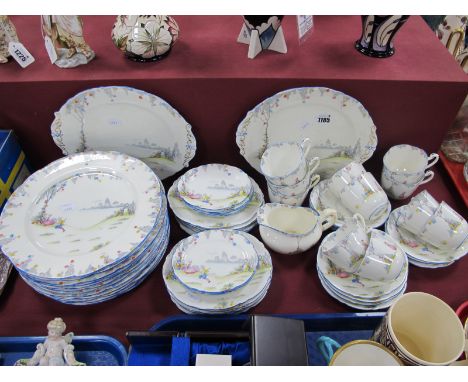 A c 1900's Paragon China Dinner Service, pattern No 71302 printed with a garden scene with musician serenading lady, enamel f
