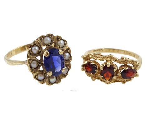 Gold three stone garnet ring and  a gold pearl and blue paste stone set cluster ring, both 9ct Condition Report:Approx 6.15gm