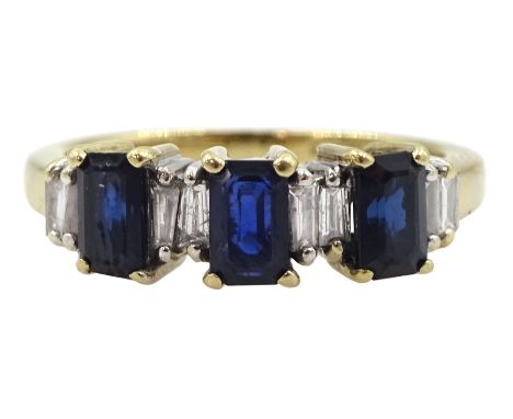 9ct gold three stone emerald cut sapphire ring, with baguette diamonds set between, hallmarked, total diamond weight 0.25 car